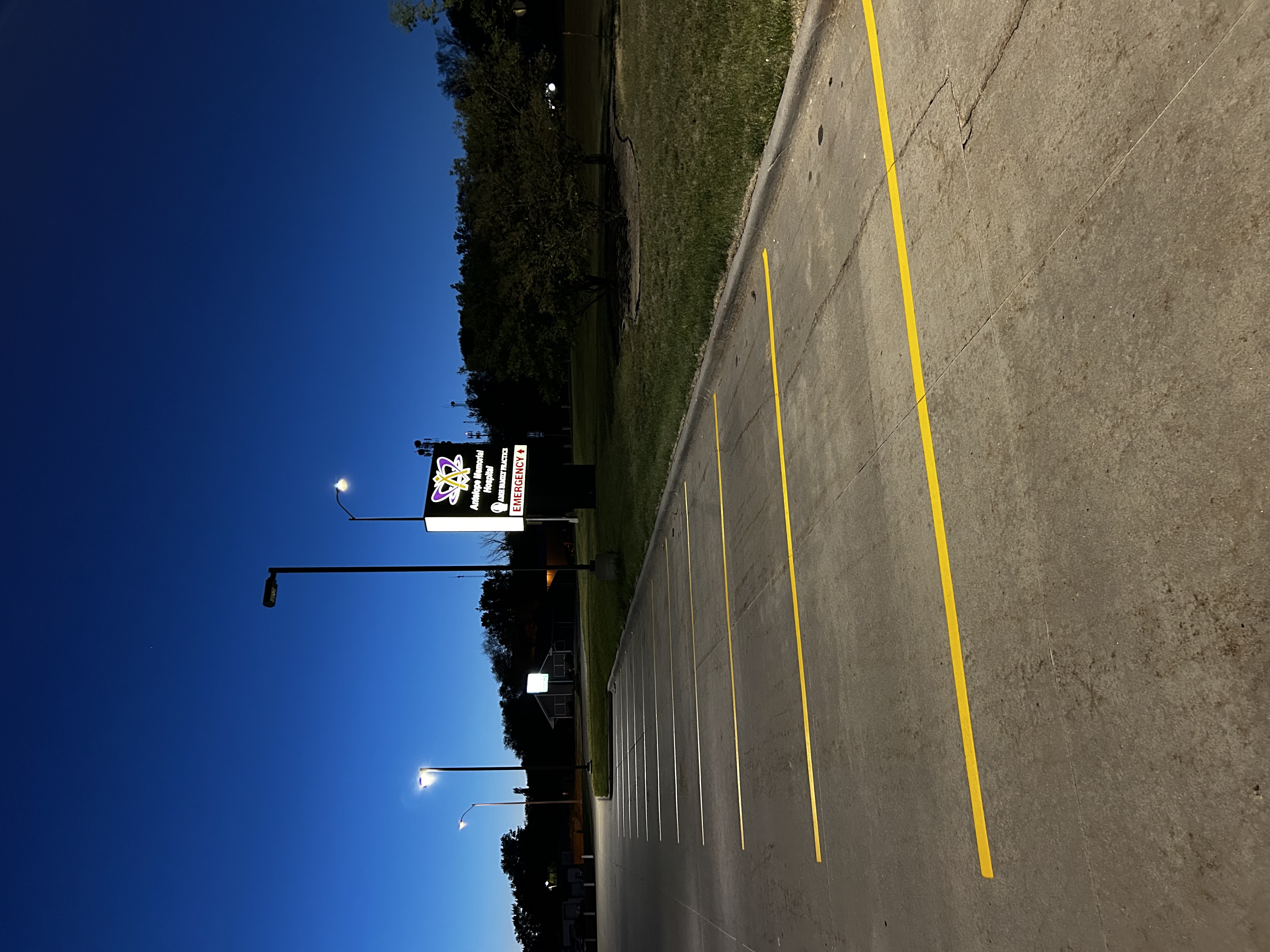 Antelope Memorial Hospital parking lot striping at night