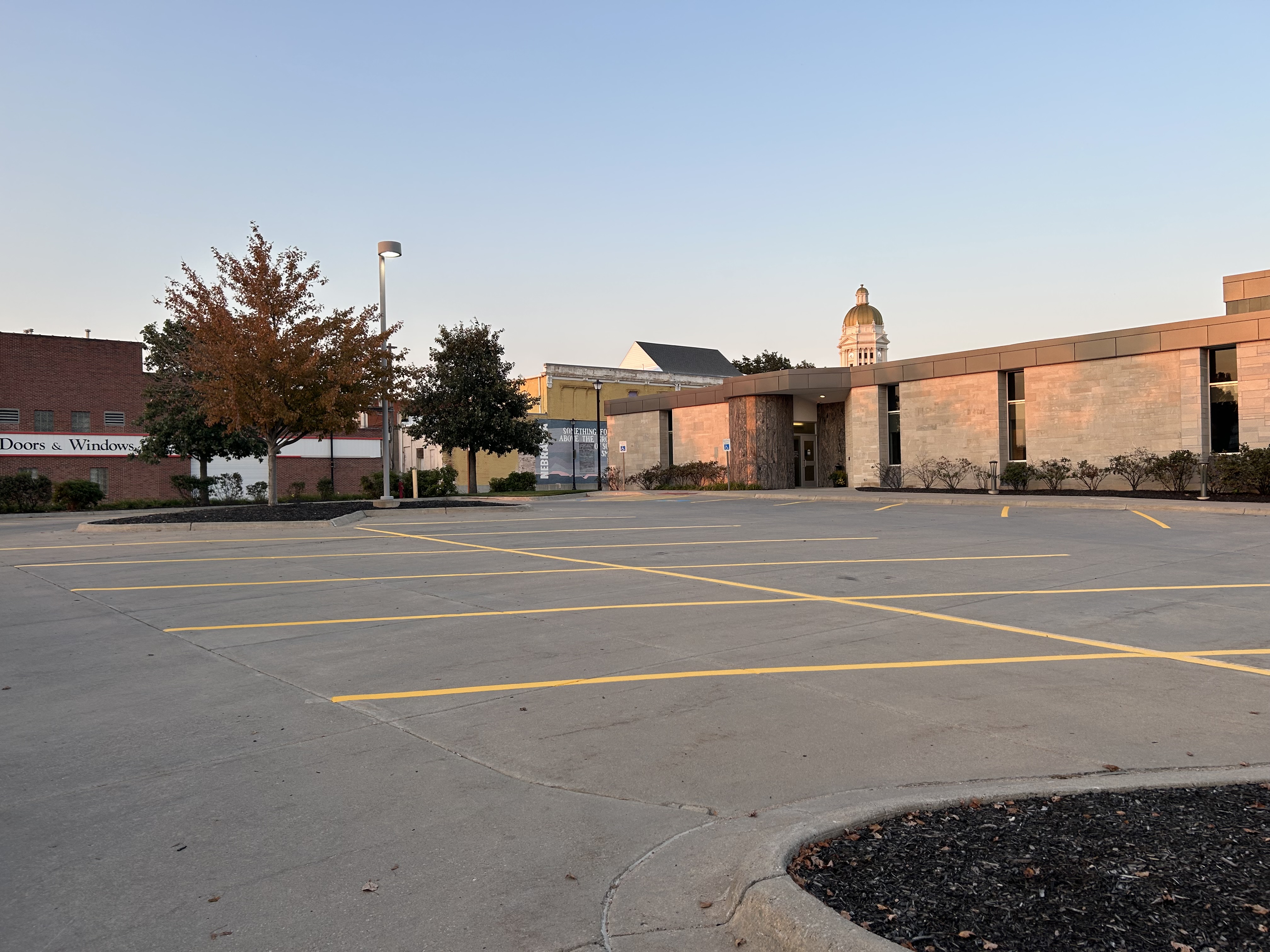 Downtown parking lot striping at golden hour with capitol dome in background